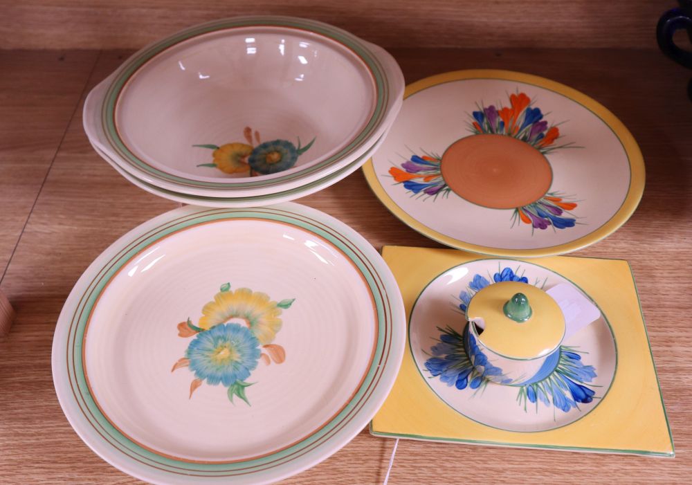 A Clarice Cliff Blue Crocus square plate and lidded mustard, two Spring Crocus dishes, a Crocus plate,